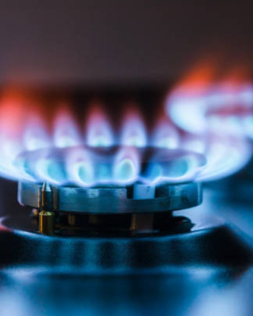 Burning gas burner. Blue fire with a red flame.